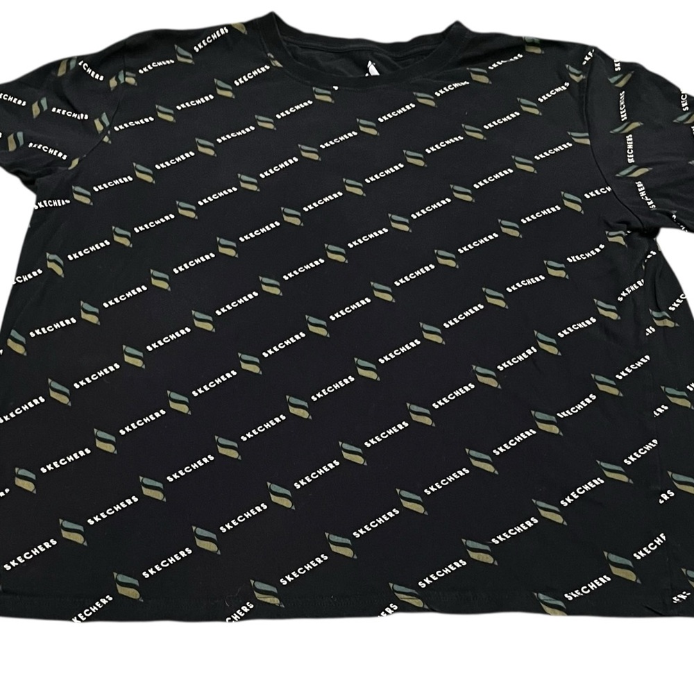 Skechers Men's Logo Print Graphic T-Shirt in black with an all-over logo print